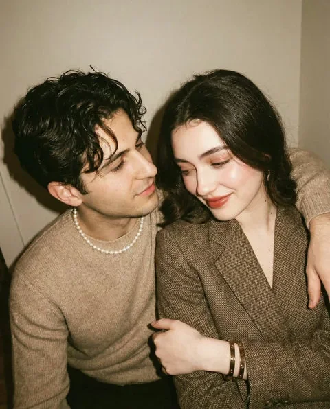 Romantic couple sharing a warm quiet moment indoors